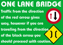 One Lane Bridge. Traffic from the direction of the red arrow gives way, however if you are traveling in the direction of the black arrow you should proceed with caution.